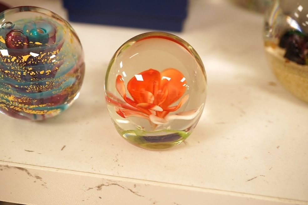 Seventeen various paperweights, including Lalique and a signed Murano example, some boxed, largest 10cm high